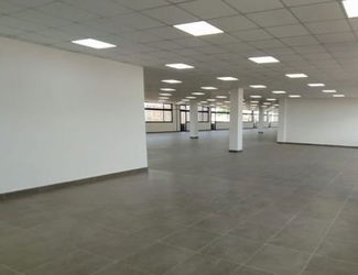Location ANKRONDRANO LOCAL 2000M² DANS 1 IMMEUBLE HAUT STANDING BAIE VITREE