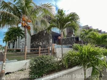 Location BAIN BOEUF Luxueux Duplex pieds dans l&#039;eau piscine vue lagon