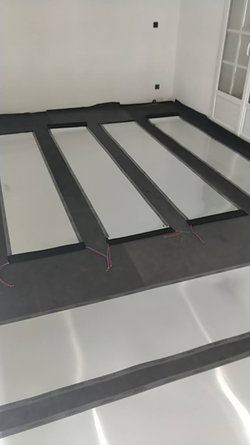 Chauffage au sol sous parquet flottant ou collé