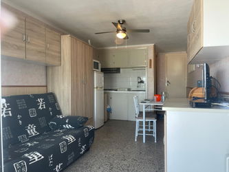 studio avec terrasse et piscine commune à Roses